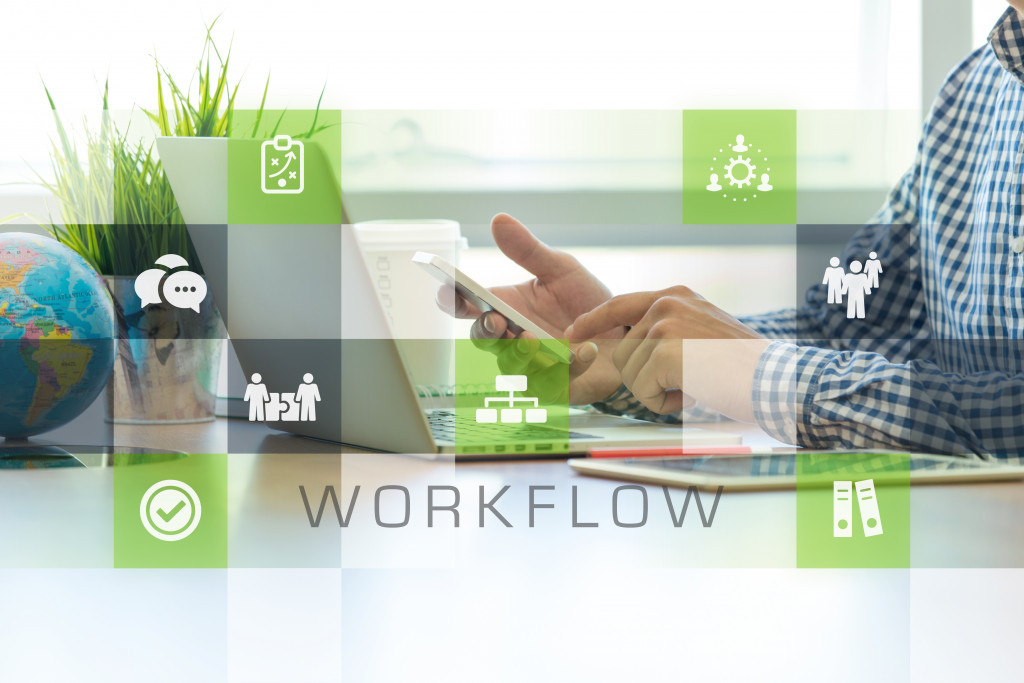 Businessman working in office and Workflow icons concept